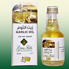 Garlic oil macerated in cold-pressed sesame oil bottle - Green Fields Oils